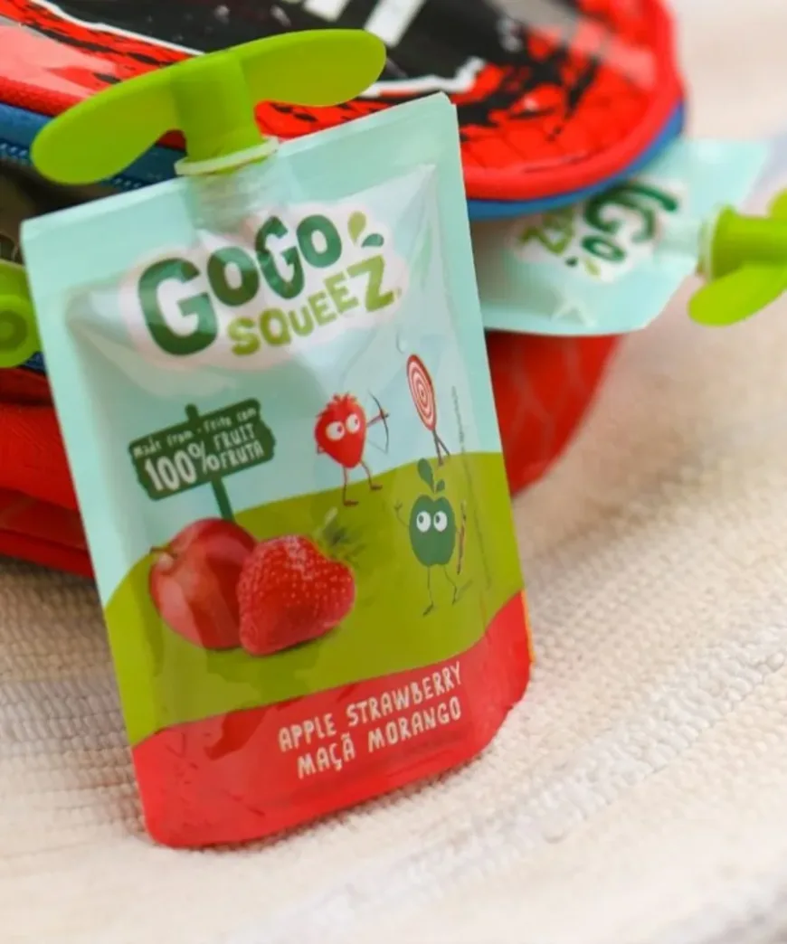 Apple Strawberry point resting on backpack